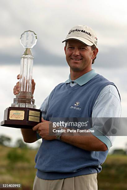 Retief Goosen holds the trophy after winning the Smurfit European Open on the K-Club Smurfit course. July 4, 2004