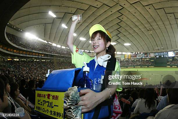 Beer vendor at MLB Opening Day the New York Yankees are defeated by the Tampa Bay Devil Rays 8-3 at the Tokyo Dome in Tokyo, Japan.