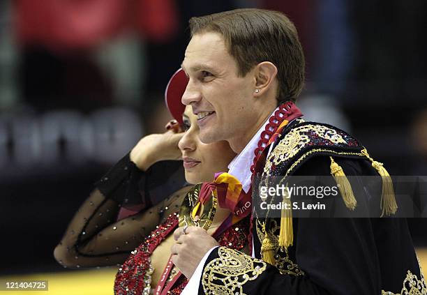 Roman Kostomarov and Tatiana Navka of Russia on the medal stand during the Ice Dancing Free Skate Program at the 2006 Olympic Games at the Palavela...
