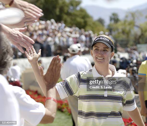 Karrie Webb gives high-fives to fans at the Kraft Nabisco Championship at The Mission Hills Country Club in Rancho Mirage, California on Sunday,...