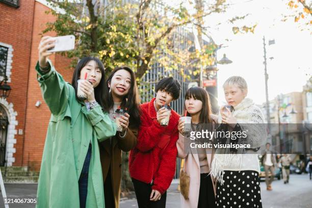 Group picture of friends enjoying bubble tea.
