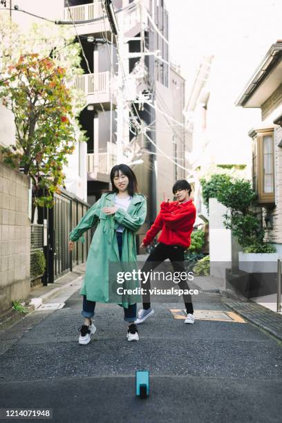young people creating videos for social media. - japanese culture on show at hyper japan stock pictures, royalty-free photos & images