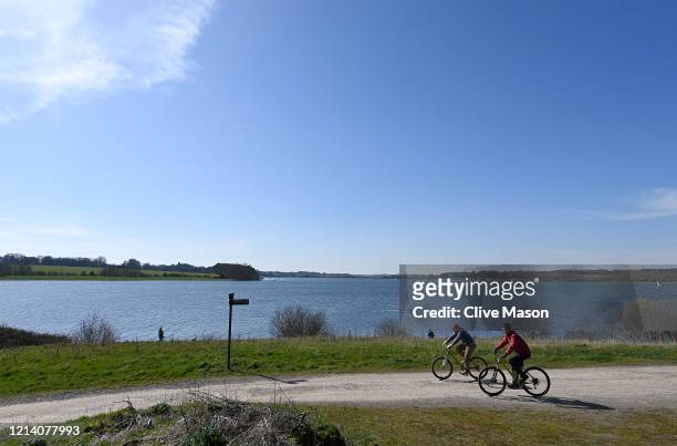 People go about the business of keeping fit as the public come to terms with social distancing and the lack of Sport at Pitsford Reservoir on March...