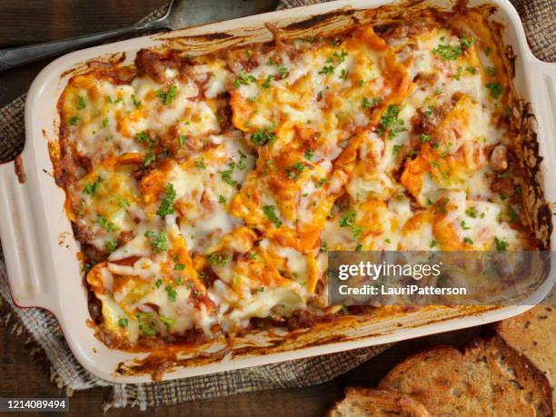 baked cheese ravioli lasagna - casserole stock pictures, royalty-free photos & images