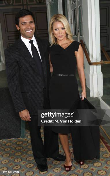 Mark Consuelos and Kelly Ripa during 18th Annual Women of the Year Luncheon at The Pierre in New York City, New York, United States.