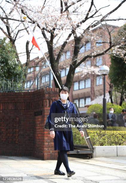 Princess Aiko, daughter of Emperor Naruhito, wearing a face mask amid the coronavirus outbreak, arrives at Gakushuin Girls' Senior High School prior...