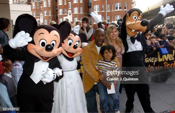 Gary Beadle and family with Mickey Mouse, Minnie Mouse and Goofy