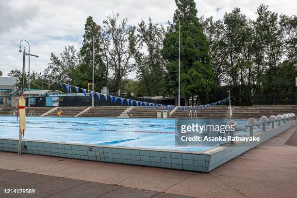 General view of the Harold Holt swimming pool with it's covers placed over the pool following a directive by that the Australian Government that...