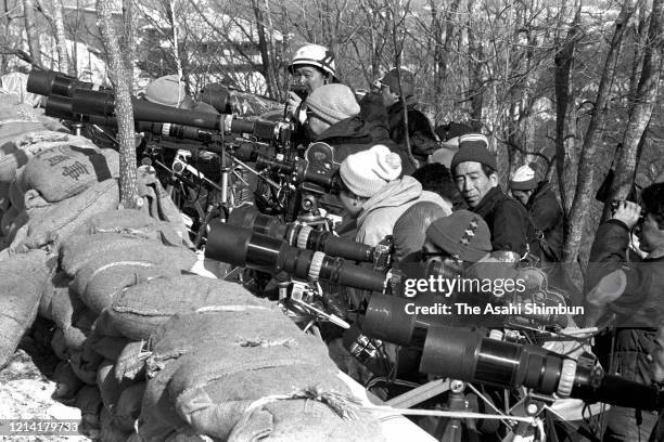 Media photographers take pictures of the Asama Sanso lodge where the United Red Army members had taken a hostage on February 28, 1972 in Karuizawa,...