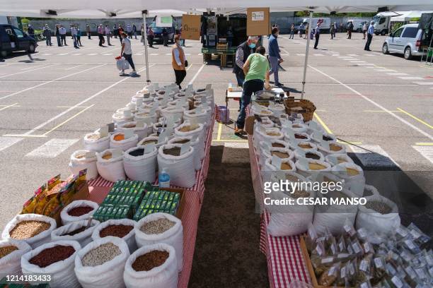 Cereales ans vegetables for sale are pictured at the open-air fruit and vegetable market in Las Torres, near Burgos, on May 20 during the national...