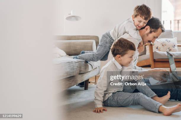 father trying to work from home - busy life stock pictures, royalty-free photos & images