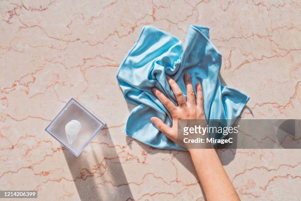 cleaning marble surface by using liquid soap - rubbing stock pictures, royalty-free photos & images