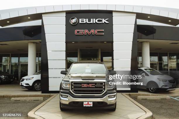 Vehicles are displayed for sale at a General Motors Co. Buick and GMC car dealership in Woodbridge, New Jersey, U.S, on Wednesday, May 20, 2020....
