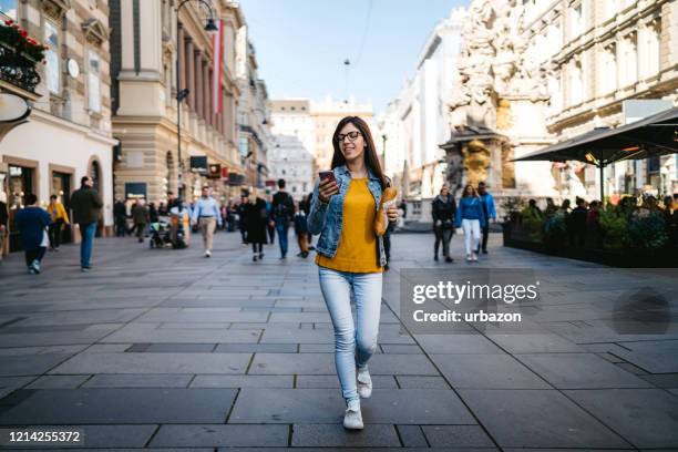 tourist woman exploring vienna - pedestrian area stock pictures, royalty-free photos & images