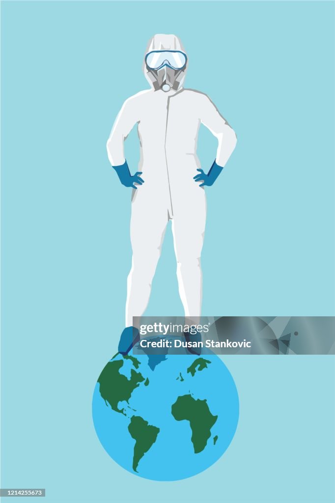 A doctor wearing full protective medical equipment