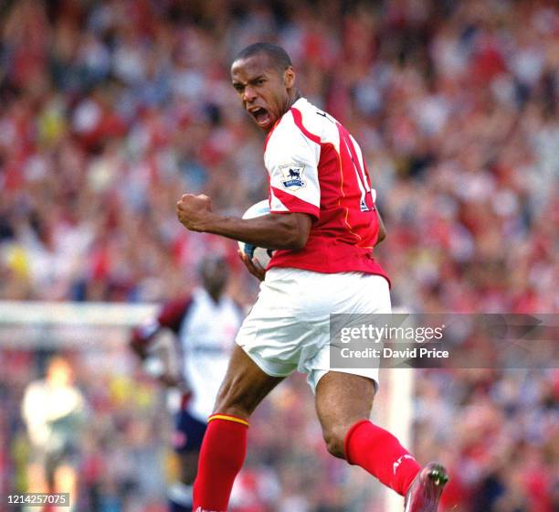 August 22: Thierry Henry celebrates the 2nd Arsenal goal during the Premier League match between Arsenal and Middlesbrough on August 22, 2004 in...