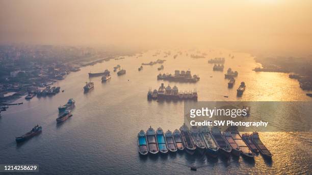 drone photo of cargo ships at chittagong port, chittagong, bangladesh - chittagong stock pictures, royalty-free photos & images