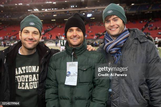 Paul Rudd, Will Forte and Bill Hader attend the New York Jets vs Denver Broncos game in the rain at The Meadowlands on November 30, 2008 in East...