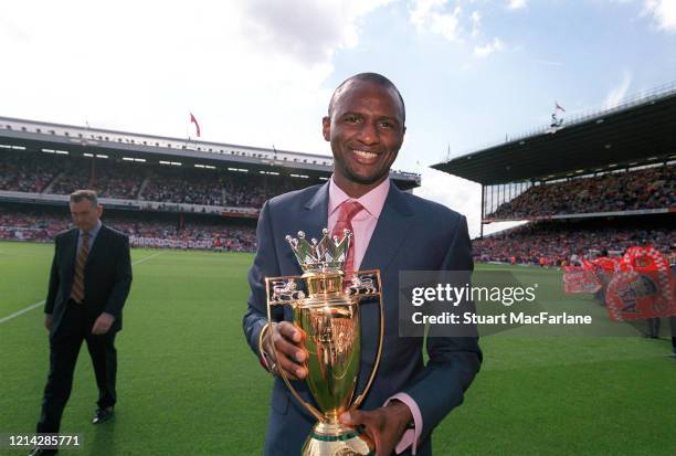 Patrick Vieira of Arsenal with the Unbeaten Trophy before the Premier League match between Arsenal and Middlesbrough on August 22, 2004 in London,...