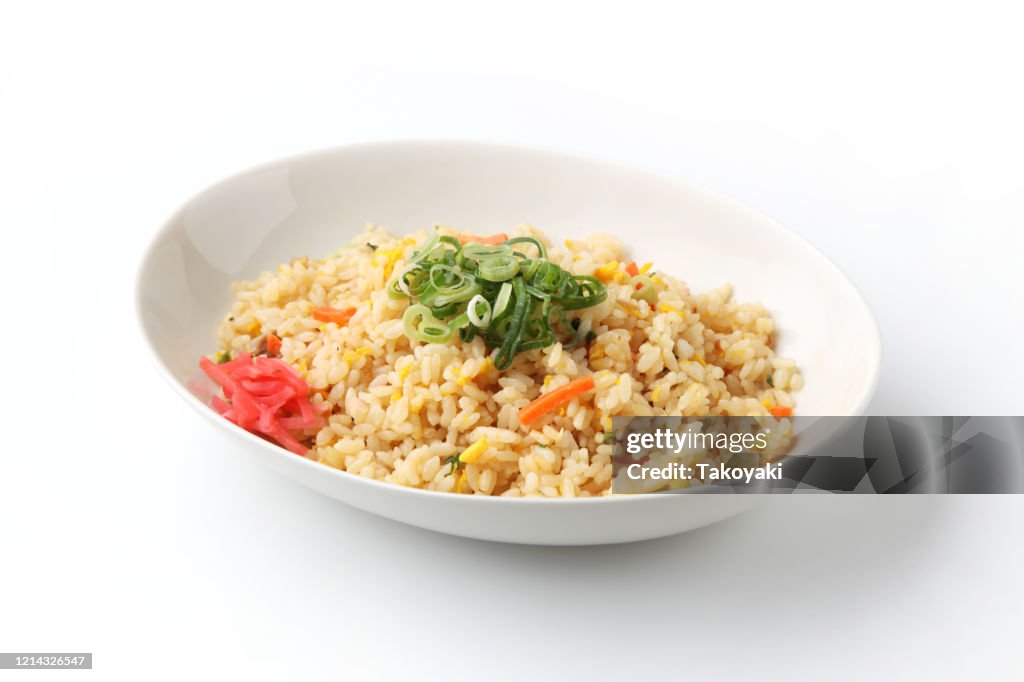 Fried rice on plate isolated on white background