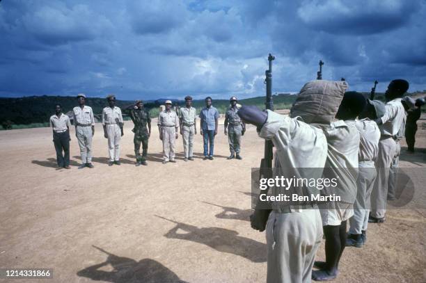 Defense secretary and staff inspecting trainees, March 1967.