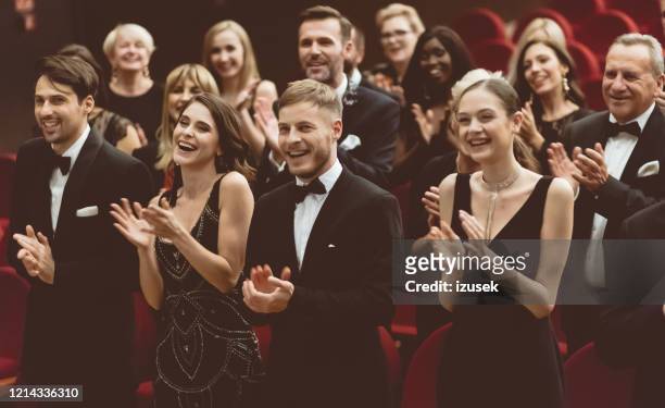 standing ovation in the theater - gala stock pictures, royalty-free photos & images
