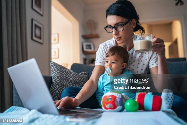 working at home mom - baby accessories the dummy stock pictures, royalty-free photos & images