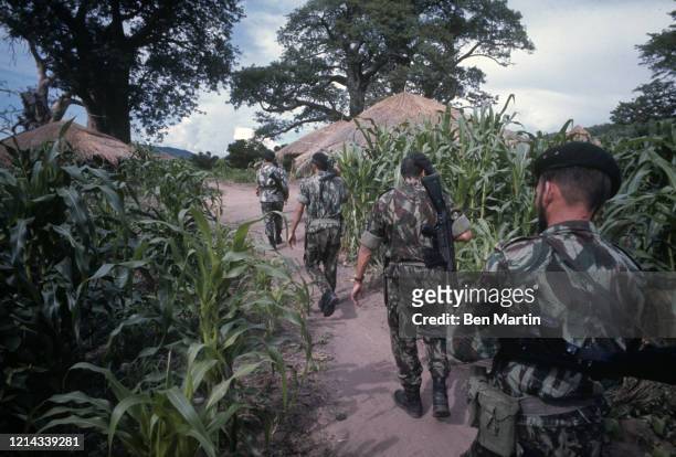 Portuguese troops enter last village in Congo before Angolan frontier, February 1967.