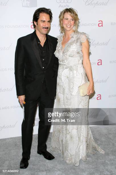 Eric McCormack and Janet Holden during 15th Annual Elton John AIDS Foundation Oscar Party at Pacific Design Center in Los Angeles, California, United...