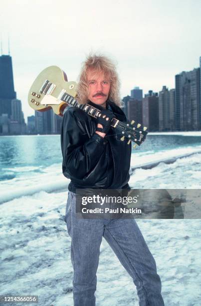 Portrait of American Rock musician James 'JY' Young, of the group Styx, as he poses outdoors, Chicago, Illinois, January 14, 1986.