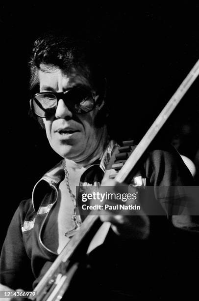 Shawnee American Rock musician Link Wray plays guitar as he performs onstage at the Ivanhoe Theater, Chicago, Illinois, October 25, 1977.