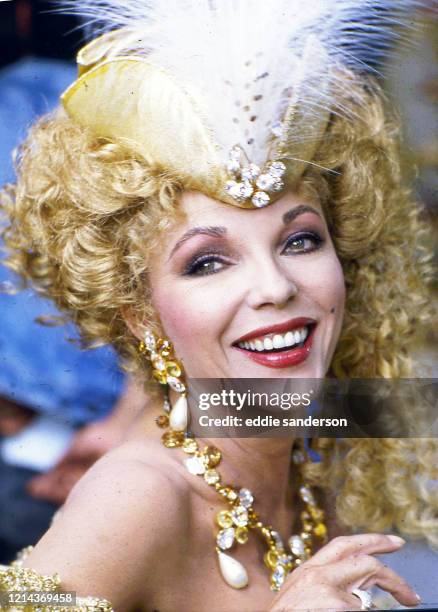 British actress Joan Collins at the Golden Ball in Venice, Italy, during location filming of the 1986 CBS miniseries Sins. Joan played the part of...