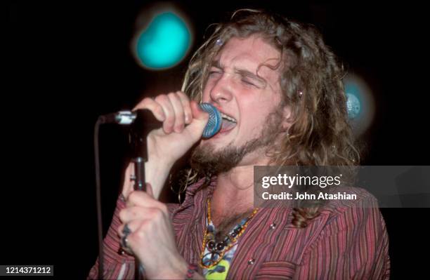 Singer Layne Staley is shown performing on stage during a "live" concert appearance with Alice In Chains on November 19, 1990. .