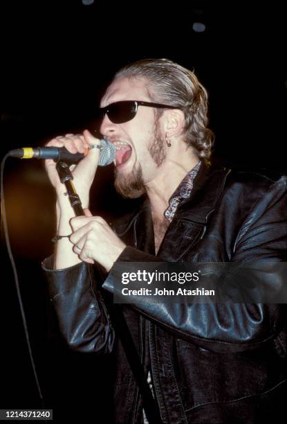 Singer Layne Staley is shown performing on stage during a live concert appearance with Alice In Chains on October 29, 1991. "n