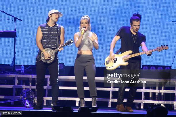 The Band Perry are shown performing on stage during a live concert appearance on September 25, 2015. ."n"n