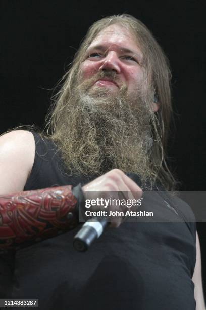 Singer Johan Hegg is shown performing on stage during a "live" concert appearance with Amon Amarth on July 21, 2013.