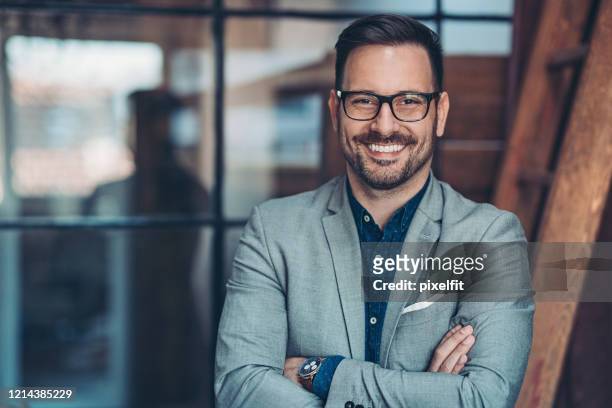 smiling businessman - white jacket imagens e fotografias de stock