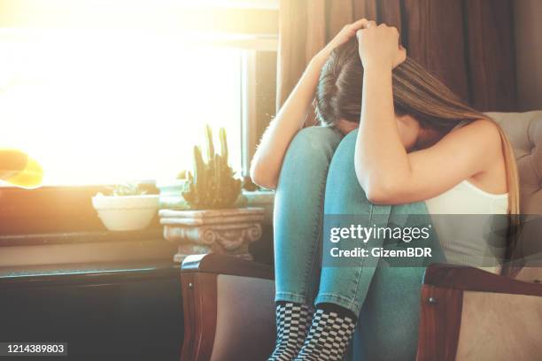 late depressed woman - terrified stock pictures, royalty-free photos & images