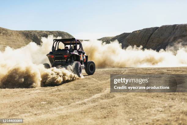 men and boys outdoor activities off-road fun in western colorado desert - veículo todo o terreno imagens e fotografias de stock