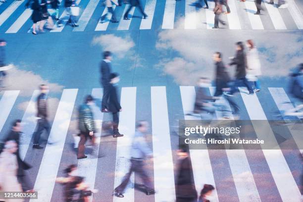 people walking on the city with clouds, multi-layer image - social & economic life stock pictures, royalty-free photos & images