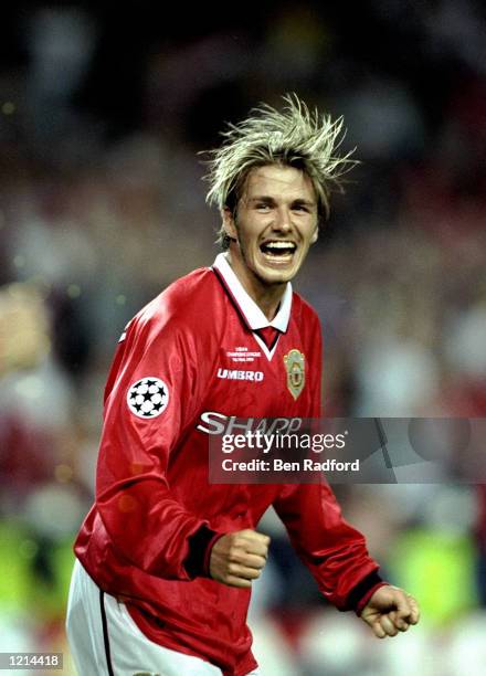 David Beckham of Manchester United celebrates victory over Bayern Munich in the UEFA Champions League Final at the Nou Camp in Barcelona, Spain....