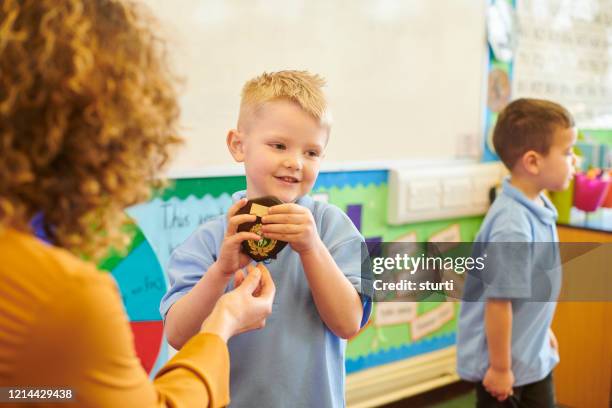 school trophy - pride awards ceremony stock pictures, royalty-free photos & images