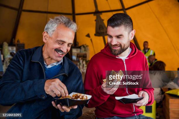 great company and great food - father in law stock pictures, royalty-free photos & images