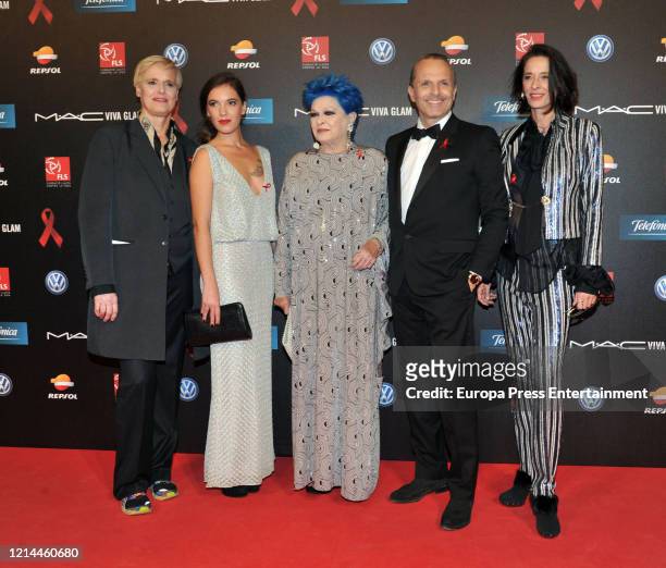 Lucia Dominguin , Lucia Bose , Miguel Bose and Paola Dominguin attend 'People in red' photocall on November 25, 2013 in Barcelona, Spain.
