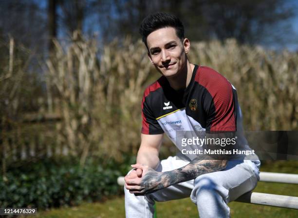 German gymnast Marcel Nguyen poses for a portrait during a training session for the Tokyo 2020 Olympics at his mother's garden on March 24, 2020 in...