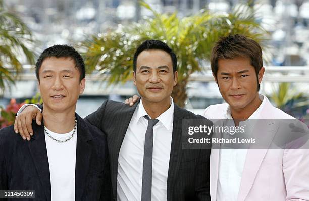 Sun Hong Lei, Simon Yam and Louis Koo during 2007 Cannes Film Festival - "Triangle" Photocall at Palais de Festival in Cannes, France.