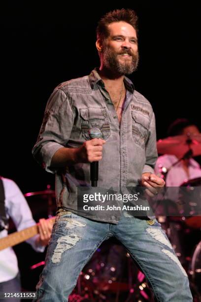 Singer Bo Bice is shown performing on stage during a live concert appearance with Blood, Sweat & Tears on July 24, 2005.