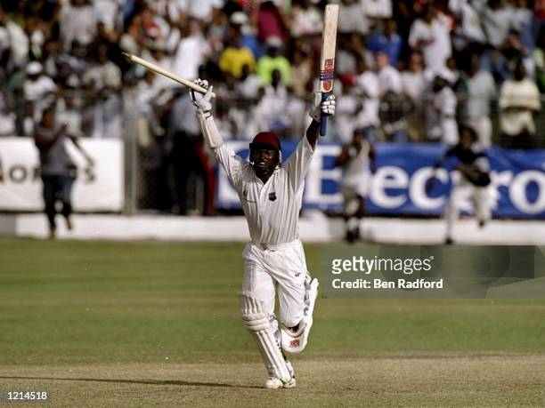 West Indies captain Brian Lara celebrates after hitting the winning runs in the Third Test against Australia at the Kensington Oval in Bridgetown,...