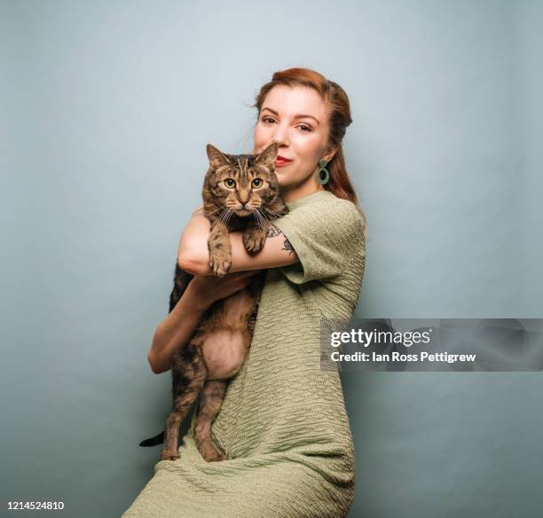 beautiful young woman holding cat - cat hipster no stock pictures, royalty-free photos & images