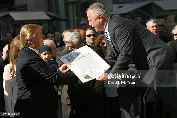 Donald Trump and Tom LaBonge during Donald Trump Honored With a Star on the Hollywood Walk of Fame at 6801 Hollywood Blvd. In front of Hollywood and...